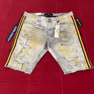 These “Legacy loaded” grey jeans are splashed with gold for an enhanced look